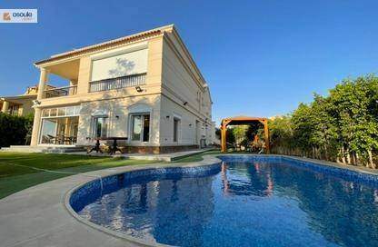 A fully furnished villa with swimming pool for sale in Madinaty