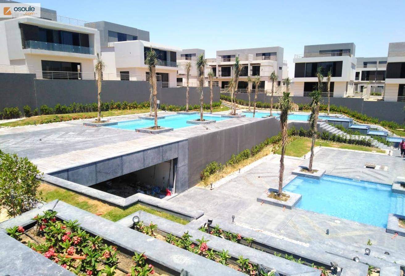 Twin villa for sale in Patio Al Zahraa next to Al Ahly Club
