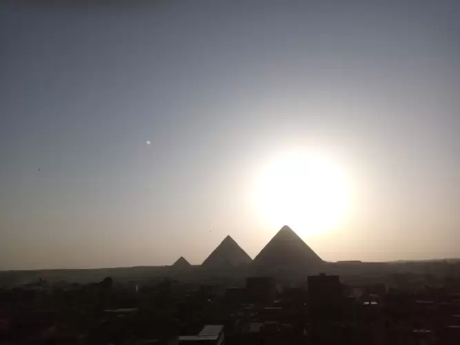 Look at the entire pyramids of Giza from your apartment